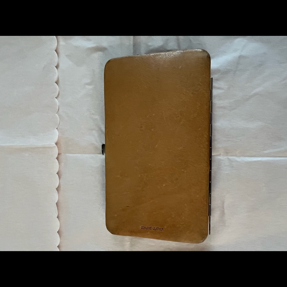 Naturalized leather wallet